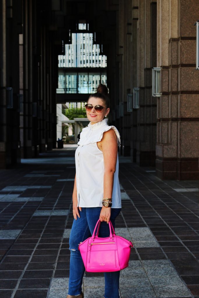 White Ruffle Blouse. Denim skinny jeans